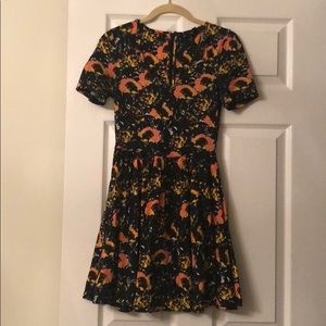 Black and orange mini dress